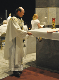 FATHER Jim Kent, O.F.M. Conv. presides at Mass.