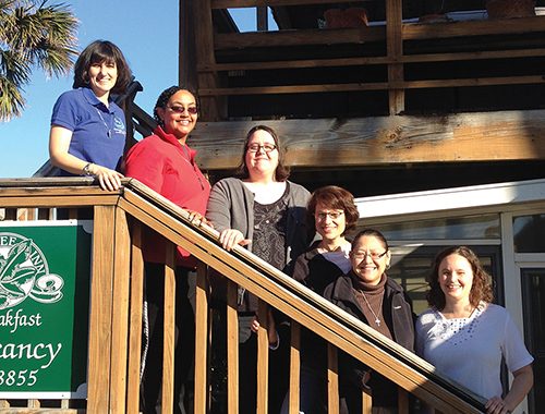 Sister Susan Rose Francois, C.S.J.P. (center) with members of the Giving Voice Core Team. 