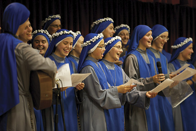 Since first vows is a special occasion, “these are the sisters of [our] house of studies in Washington, presenting our song!”