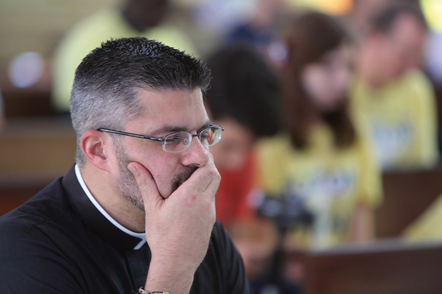 A priest in prayer