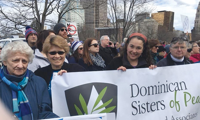 Sr. Gonzalez bands together with her community to demonstrate in favor of solutions to gun violence.