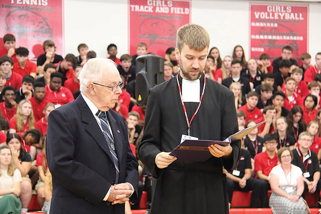 Brother Sam Amos, F.M.S. renews his vows at Mass at Marist High School in Chicago where he co-teaches “Faith, Science, and Reason.”