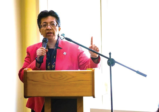 Sister Teresa Maya, C.C.V.I. addresses a group. 