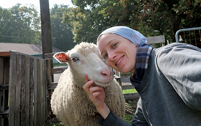 Sister Lily Key, O.C.S.O. poses with Ella, who is considered the diva of the flock.