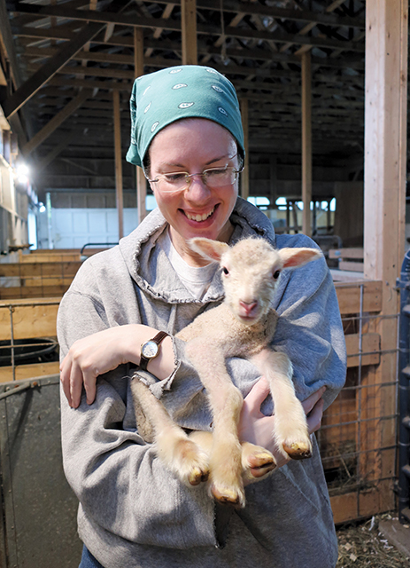 Mother Sofia Millican, O.C.S.O. holds Lambert a few hours after he was born. 