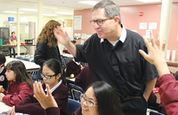 Brother Joseph Kirk, F.S.C. in the classroom with students