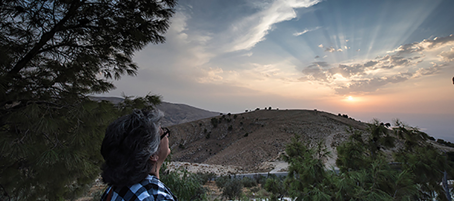 woman gazing at Mount Nebo