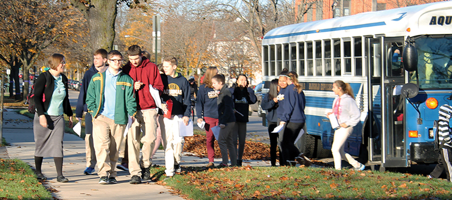 Sister Julia Walsh, F.S.P.A. chaperones students on a field trip. 