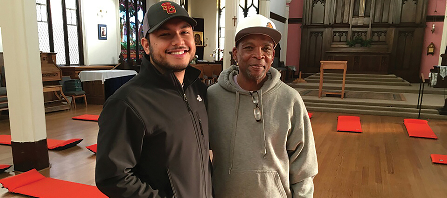 Jose Lopez (left)  with a friend at St. Boniface Church in San Francisco.