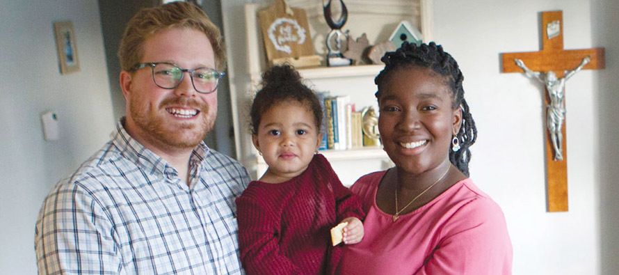 Evan and Elyssa Bradfield with their daughter, Josie.