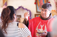 Father Ponchie Vásquez, O.F.M. celebrates a Mass at one of the 40 village chapels located within the reservation of the Tohono O’odham.